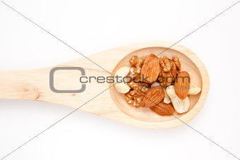 Wooden spoon with nuts
