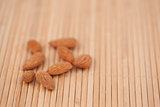 Eight almonds laid out together