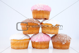 Pyramid of muffins with icing sugar