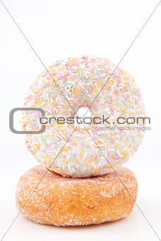 Doughnut with multi coloured icing sugar 