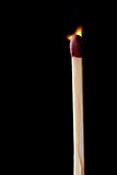 Close up of a match set on fire