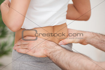 Close-up of a man touching the hips of a woman