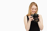 Cheerful woman looking at her camera