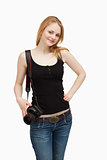 Woman carrying a camera around her shoulder