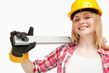 Young woman holding a spirit level