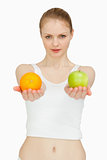 Woman presenting fruits
