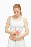 Woman placing her hands on her stomach