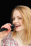 Fair-haired woman singing