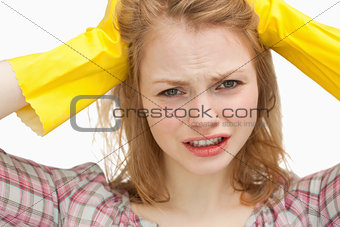 Close up of a woman pulling her hair
