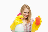 Woman holding cleaning agents