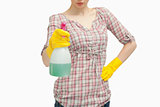 Close up of a woman holding a spray bottle