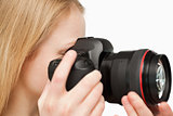 Close up of a young woman holding a camera