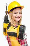 Smiling woman holding an electric screwdriver