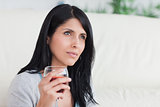 Woman holding a glass full of wine