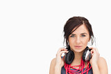 beautiful student with headphones around her neck