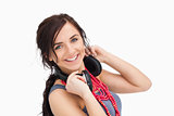 Modern young woman with a headphones around her neck