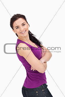 Blue eyed woman with folded arms
