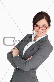 Attractive blue eyed secretary with folded arms