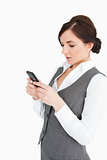 Attractive woman text-messaging