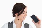 Young businesswoman looking her smartphone