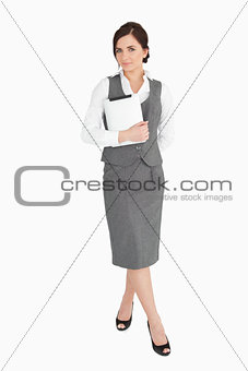 Beautiful businesswoman holding an ebook reader
