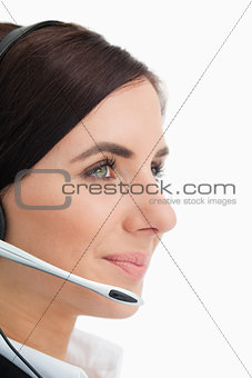 Green eyed woman wearing a headset