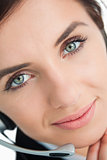 Blue eyed woman with headset