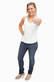 Cheerful blonde woman showing her thumbs up