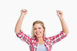 Cheerful blonde woman raising her two fists