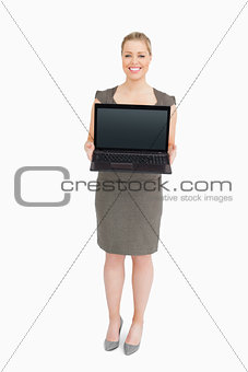 Woman showing a laptop