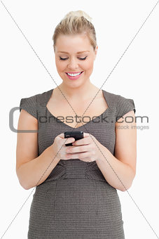 Woman texting on her smartphone