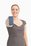 Woman showing a smartphone