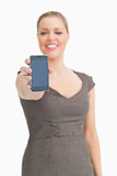 Smartphone being showed by a woman