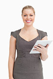 Woman smiling while using an ebook