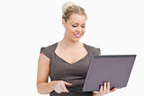 Woman browsing on a laptop