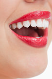 Close-up of the lips of a happy woman