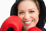 Woman smiling boxing