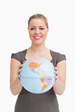 Woman holding a globe 