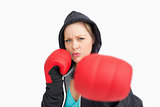 Woman with gloves hitting
