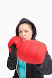 Concentrated woman boxing