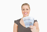 Woman smiling showing euros banknotes