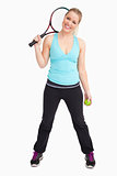 Woman having a ball and tennis racquet