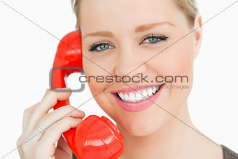 Woman using a retro phone
