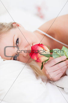 Young woman with a rose