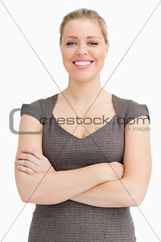 Woman standing with crossed arms