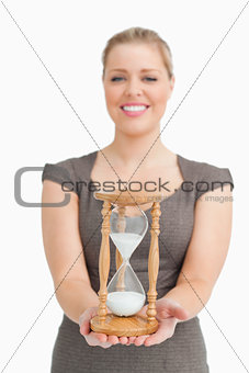 Woman smiling showing a hourglass
