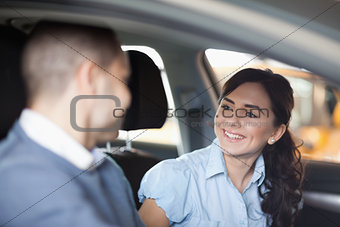Couple smiling in a car