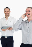 Laughing men with a phone and a tablet computer