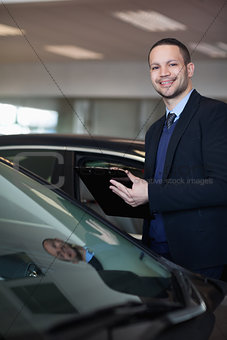 Man holding a notepad