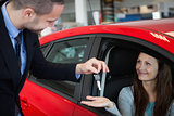 Customer receiving car keys